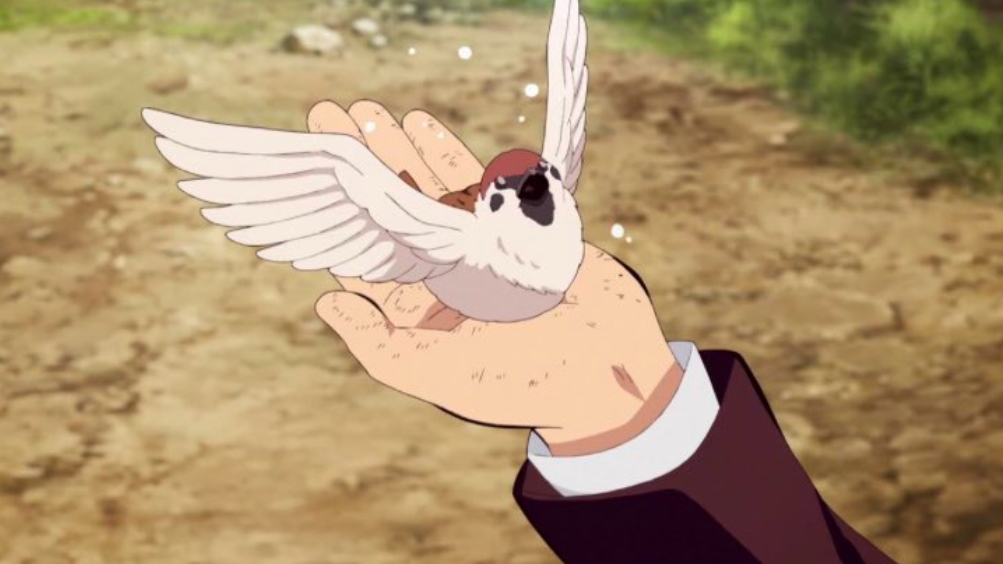 炭治郎の手に乗るチュン太郎