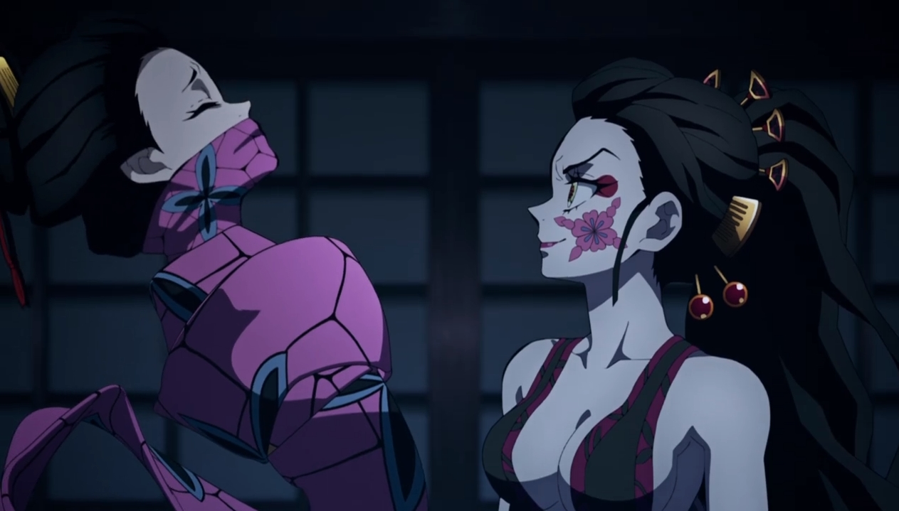 帯に巻かれた鯉夏花魁と堕姫